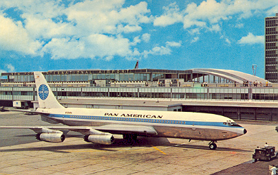 1960s A Pan Am 707 parked in front of the International Arrivals Building at JFK Airport in New York.